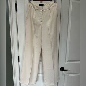 Express cream high-rise pleated trousers